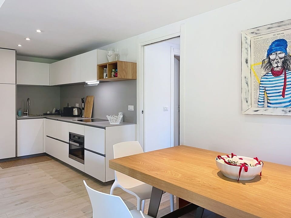 Furniture, Interior Design, Flooring, Chair, Floor, Table, Kitchen & Dining Room Table, Shade, Ceiling, Wood Stain