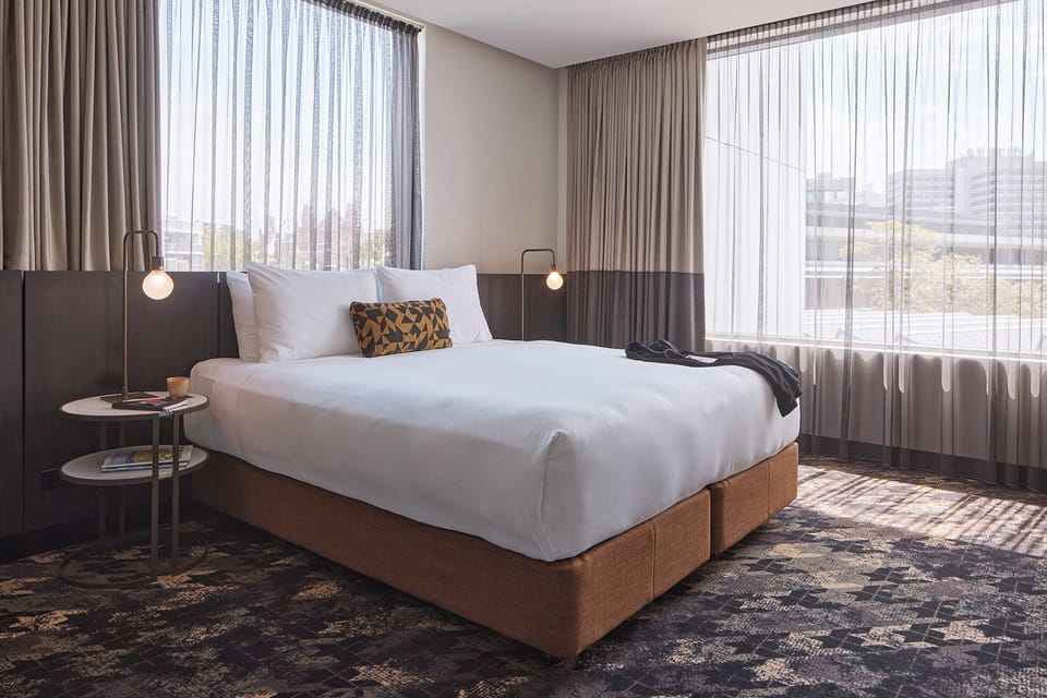 Executive Suite, 1 King Bed | Pillowtop beds, minibar, in-room safe, desk