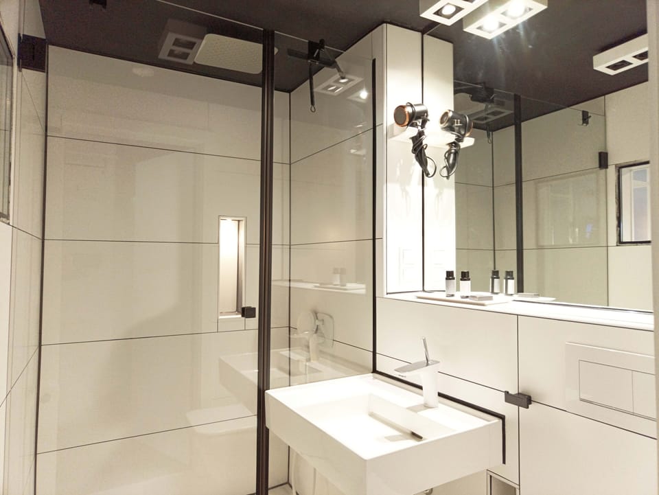 Shower, rainfall showerhead, hair dryer, heated floors