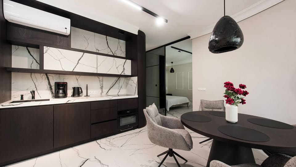 Apartment | Private kitchen | Fridge, stovetop, electric kettle, cookware/dishes/utensils