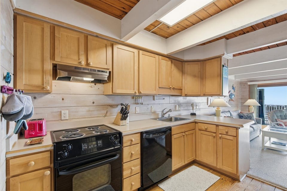 Well-Stocked Kitchen with plenty of Countertop space and full-size Appliances.