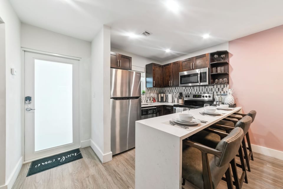 Gather at the breakfast bar and chat with family and friends while cooking.