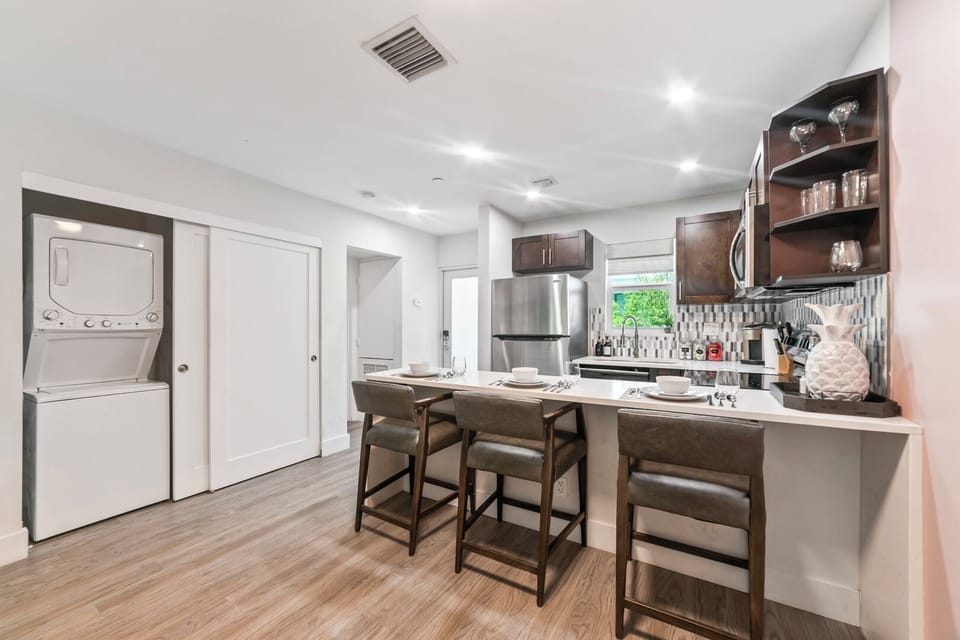 Full kitchen with in-suite washer and dryer. Laundry detergent provided. 