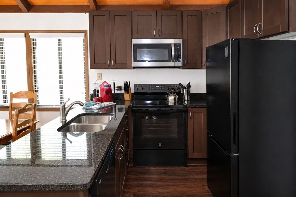 Full kitchen complete with full size appliances. Drip coffee/tea machine
