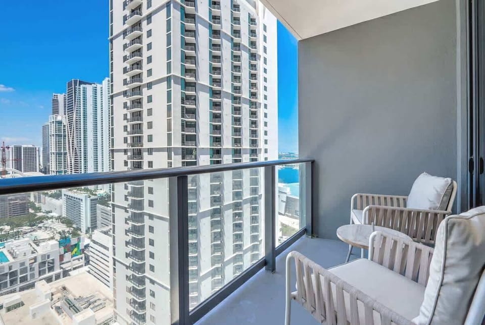 Private wraparound balcony with stunning city views