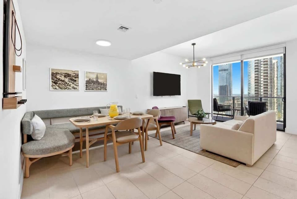 Modern living space with Smart TV and skyline views