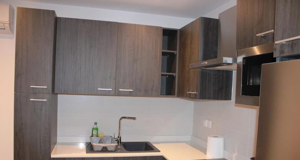 Apartment, Balcony | Private kitchen | Full-size fridge, microwave, oven, stovetop