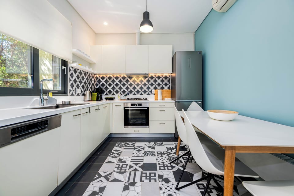 Deluxe Apartment, Garden View | Private kitchen | Full-size fridge, microwave, oven, stovetop