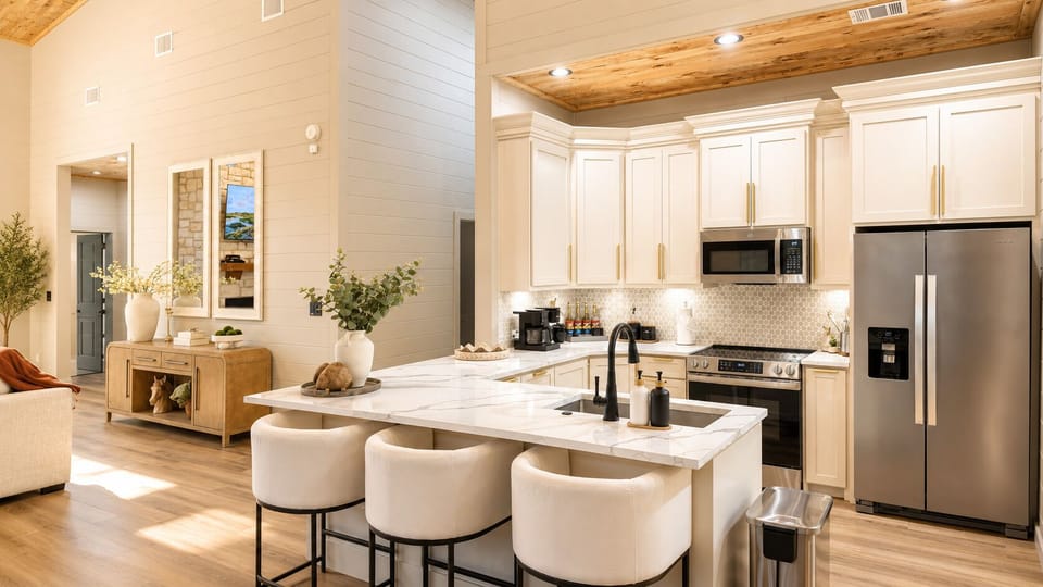 Gourmet Kitchen: Bright, modern space with sleek appliances and elegant marble countertops!