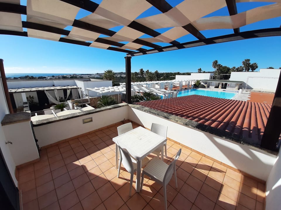 Superior Apartment, Pool View | Outdoor dining