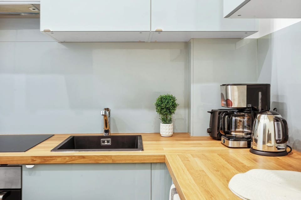The kitchen is fully equipped to prepare a simple meal 