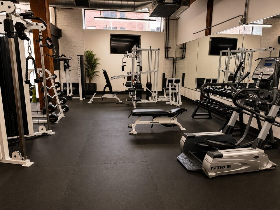 Fully equipped fitness center with cardio and strength equipment.