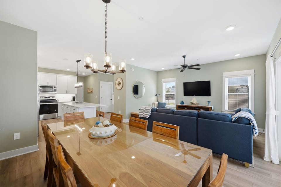 Open dining and living area designed for family meals and entertaining