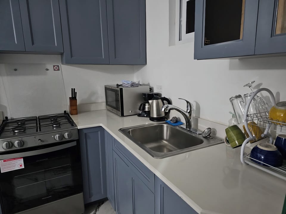 Luxury Suite, Sea View, Ground Floor | Private kitchen | Highchair