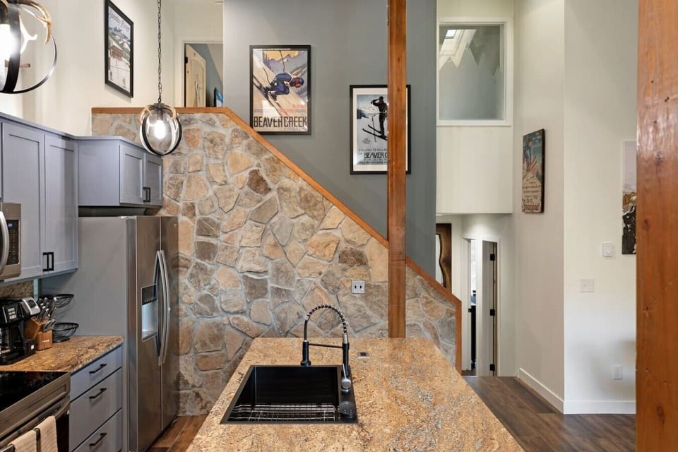 Fully equipped kitchen with large island and bar seating