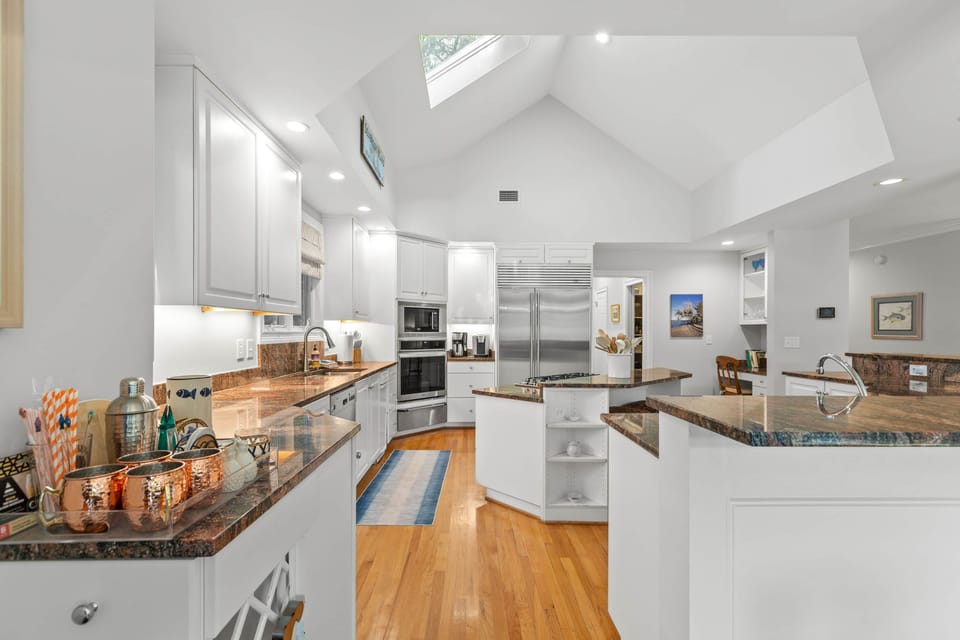 Skylight and vaulted ceiling over the working end of the kitchen