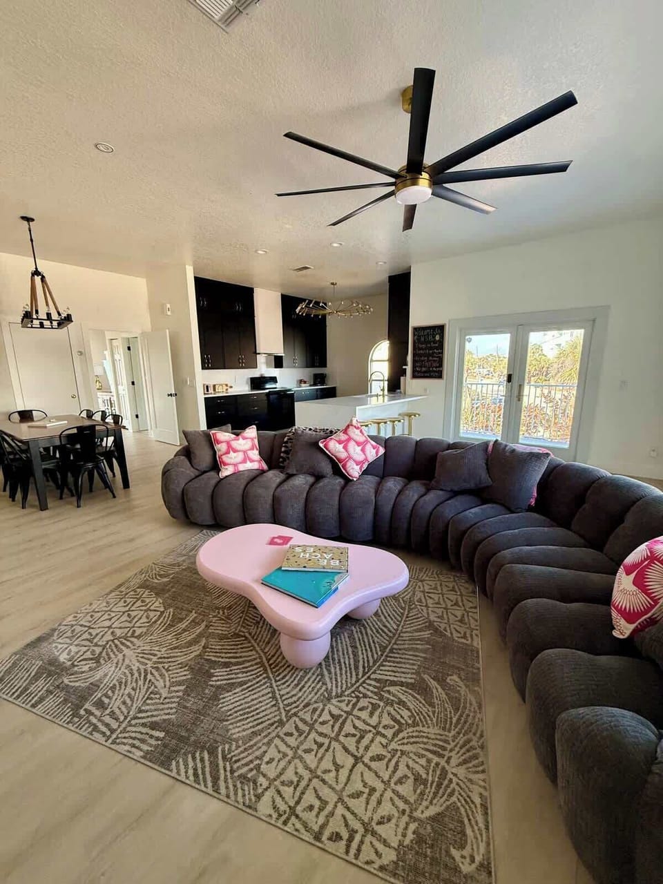 Living room, dining area, and kitchen in one large, open space