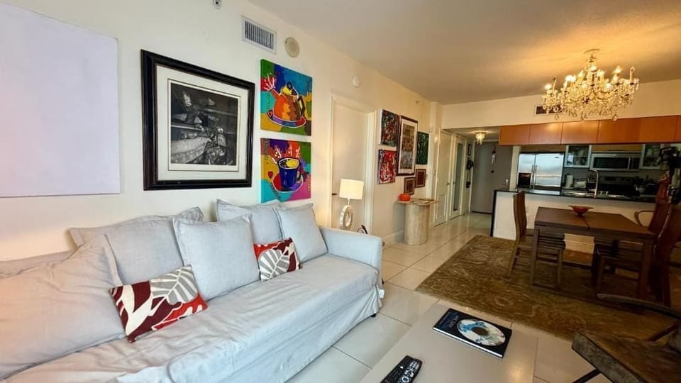Apartment, Balcony, City View | Living area | Flat-screen TV, computer monitors