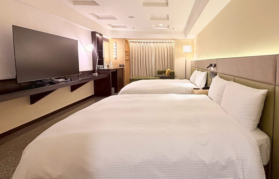 Deluxe Twin Room, City View | Free minibar, blackout drapes, soundproofing, free WiFi