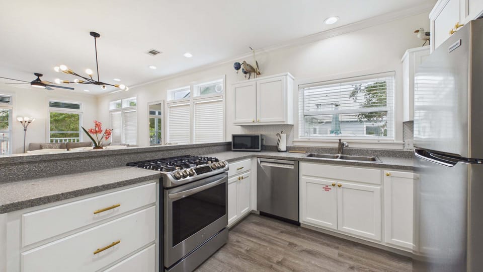 Full kitchen with stainless modern appliances and all the cooking tools for your stay