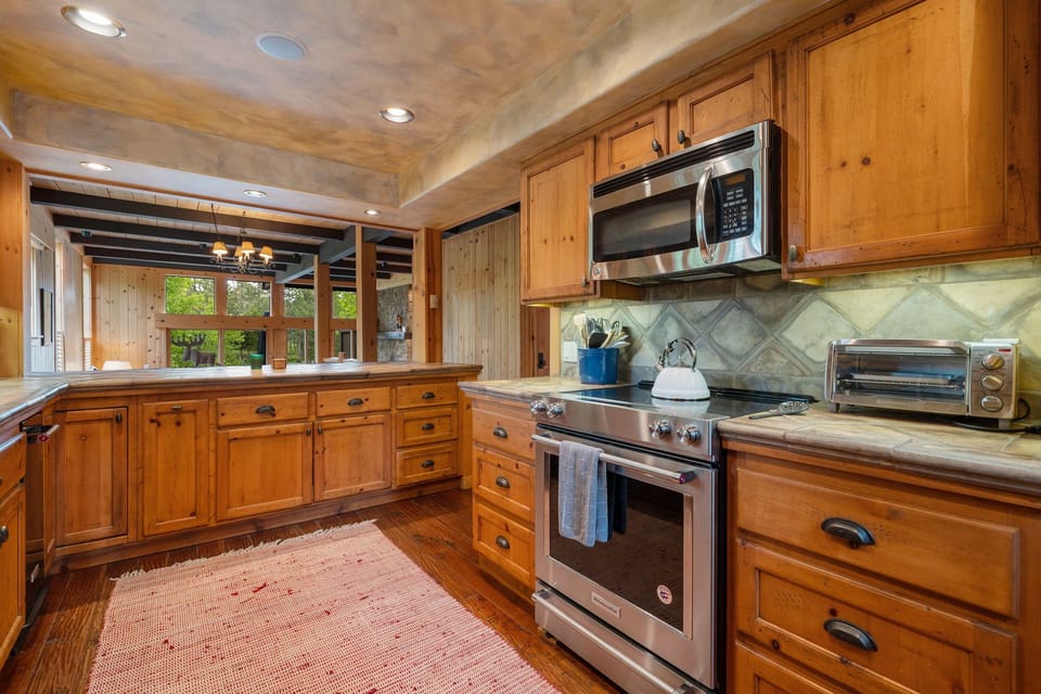 Open kitchen with stainless steel appliances