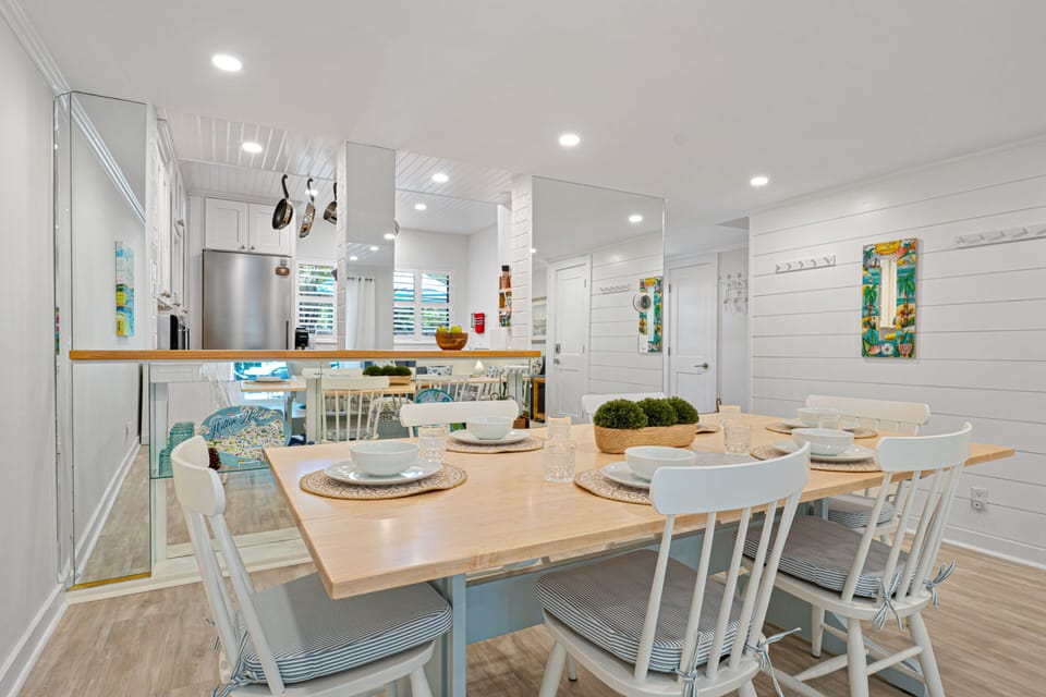 Bright dining area with seating for family meals and game nights.