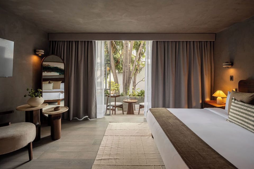 Luxury Suite, Garden View | Bathroom | Shower, hair dryer, bathrobes, slippers