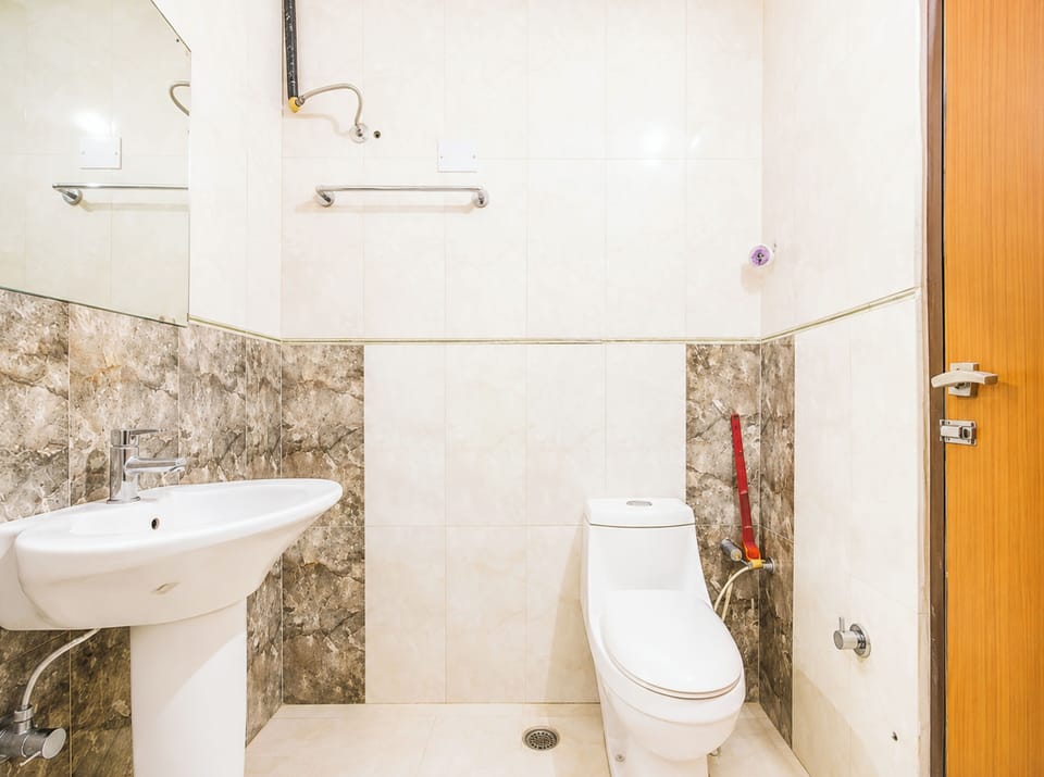 Shower, rainfall showerhead, slippers, towels