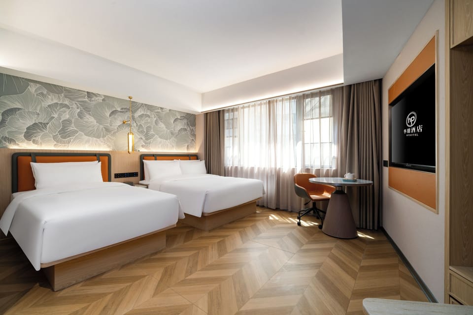 Family Suite, City View | Desk, laptop workspace, blackout drapes, soundproofing