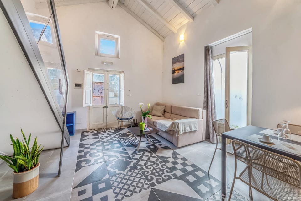 Family Apartment, 1 Bedroom, Microwave (Martano Jacuzzi Suite w/ Terrace &) | Living area