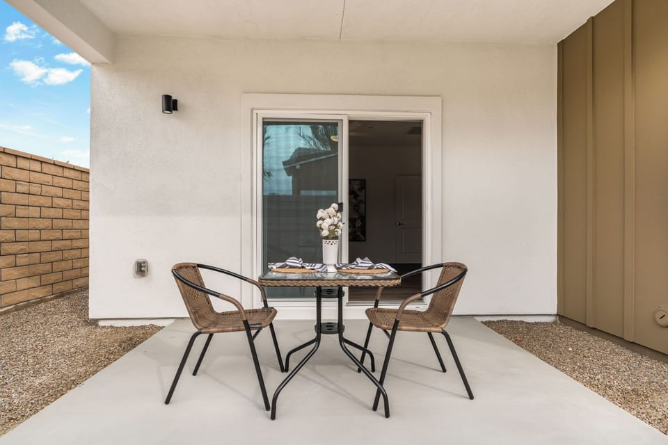 Enjoy your morning coffee on your private, fenced-in backyard patio.