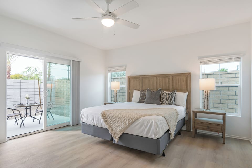The primary bedroom features a king bed with a TV and an ensuite bathroom. (Summerwell 4)