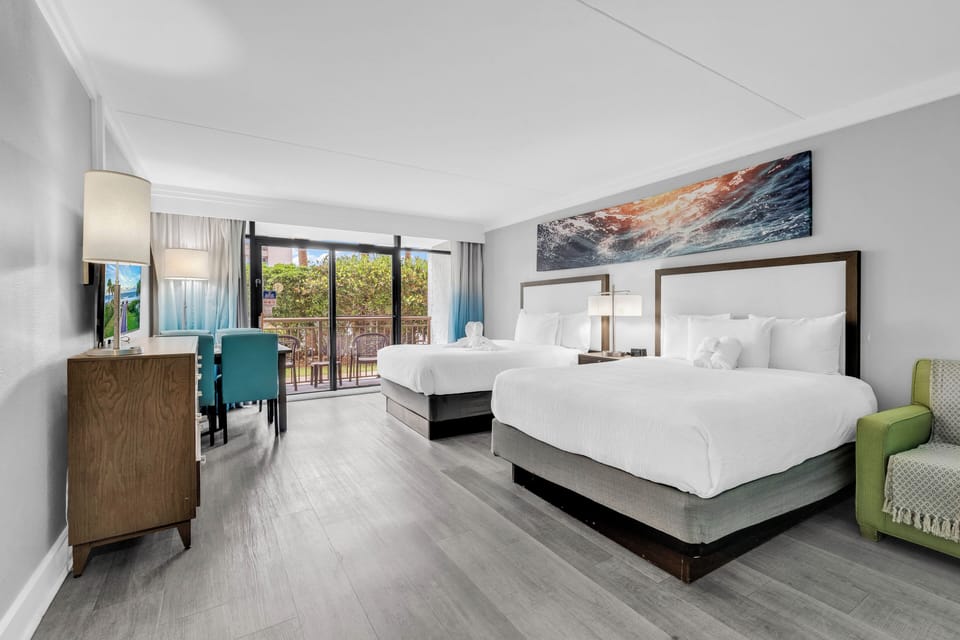 Exclusive Studio, 2 Queen Beds, Balcony, Beachfront | Living area | 55-inch Smart TV with digital channels