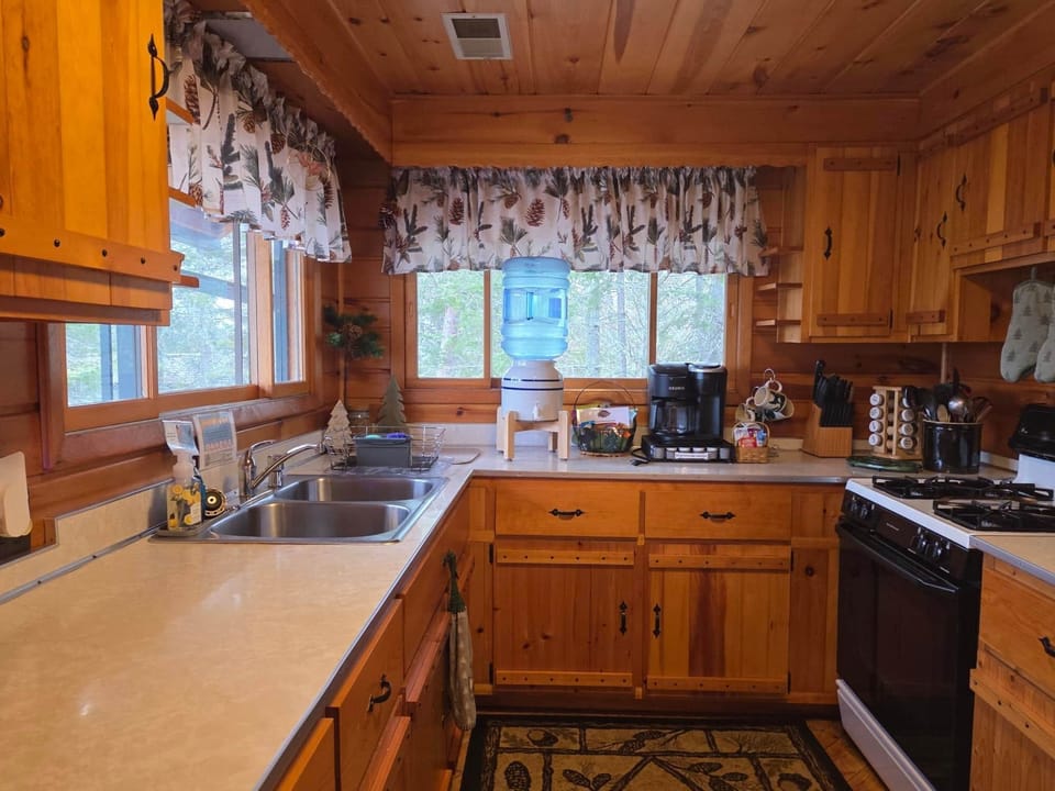 The full kitchen offers a Keurig coffee maker and plenty of counter space and cupboards