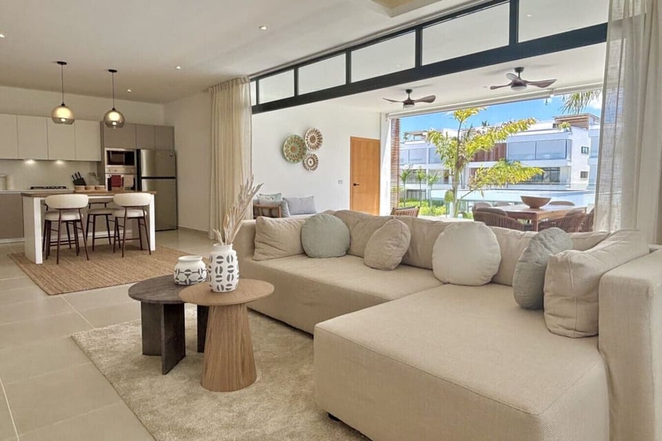 Spacious living area with a cozy sectional sofa.