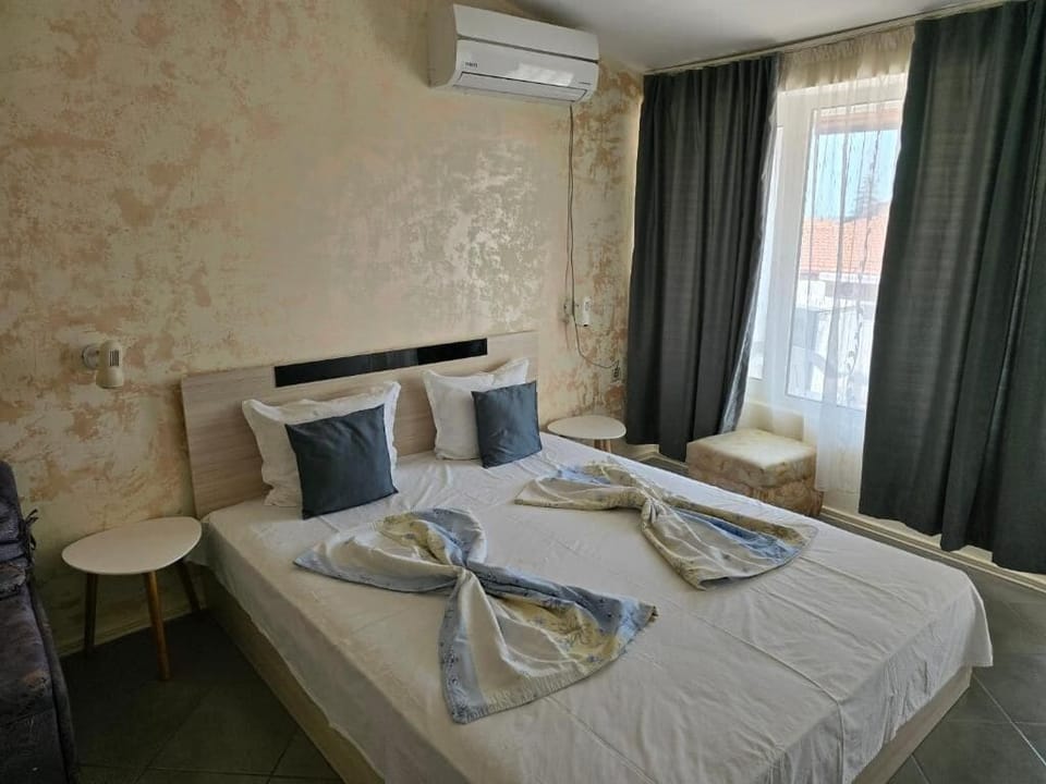 Double or Twin Room, Balcony, City View | In-room safe, desk, free WiFi