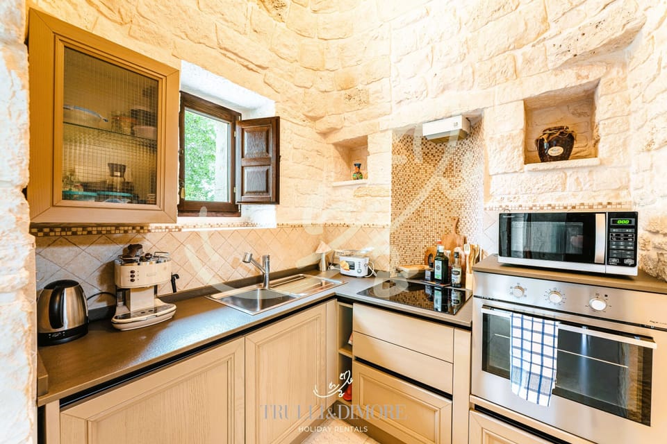 House (4 Bedrooms) | Private kitchen | Microwave, oven, espresso maker, electric kettle