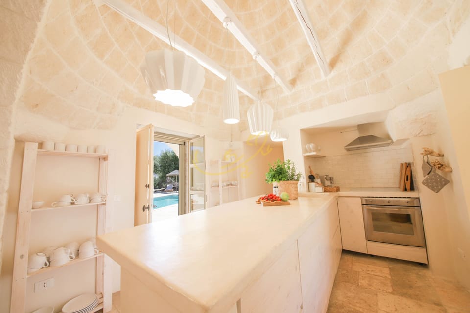 House (3 Bedrooms) | Private kitchen | Oven, espresso maker, electric kettle, highchair