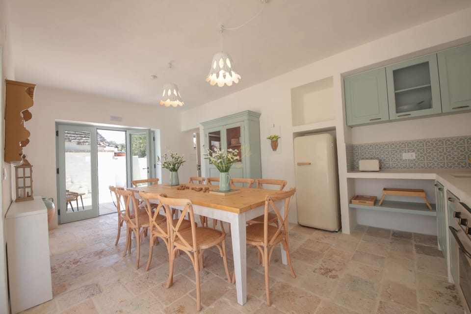 Villa (4 Bedrooms) | Private kitchen | Oven, espresso maker, electric kettle, highchair