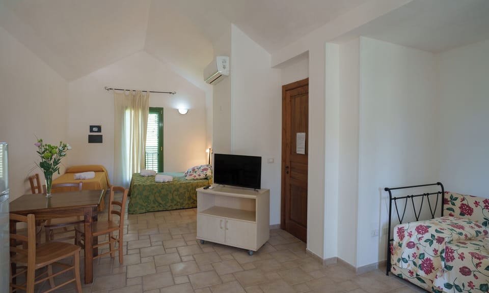 Classic Triple Room, Pool View | In-room safe, desk, free WiFi, wheelchair access
