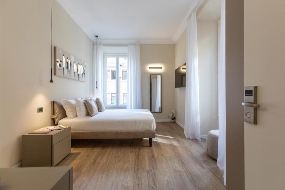 Deluxe Double Room, City View | In-room safe, blackout drapes, soundproofing, iron/ironing board