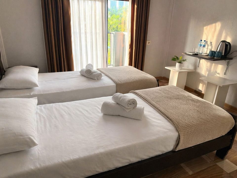 Deluxe Double or Twin Room | Blackout drapes, iron/ironing board, free WiFi