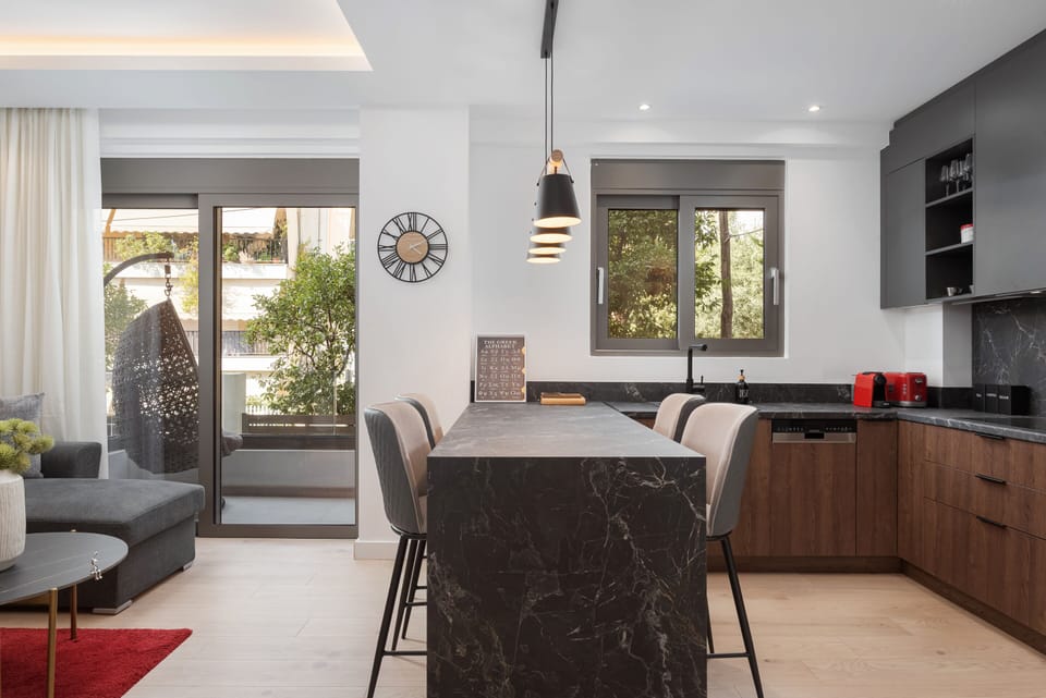 Deluxe Apartment, Balcony | Private kitchen | Espresso maker, coffee/tea maker, full-size fridge, microwave