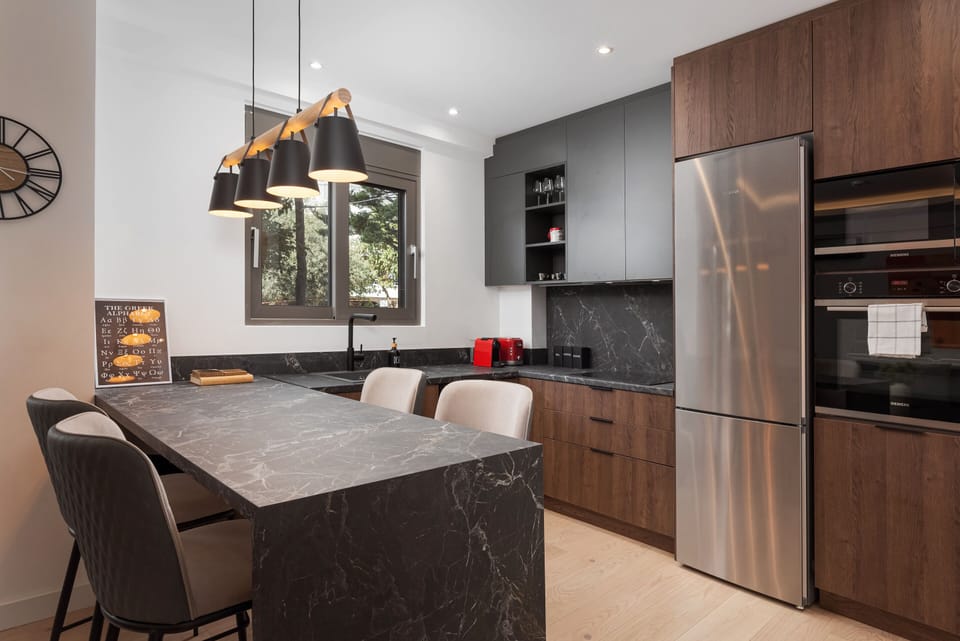 Deluxe Apartment, Balcony | Private kitchen | Espresso maker, coffee/tea maker, full-size fridge, microwave