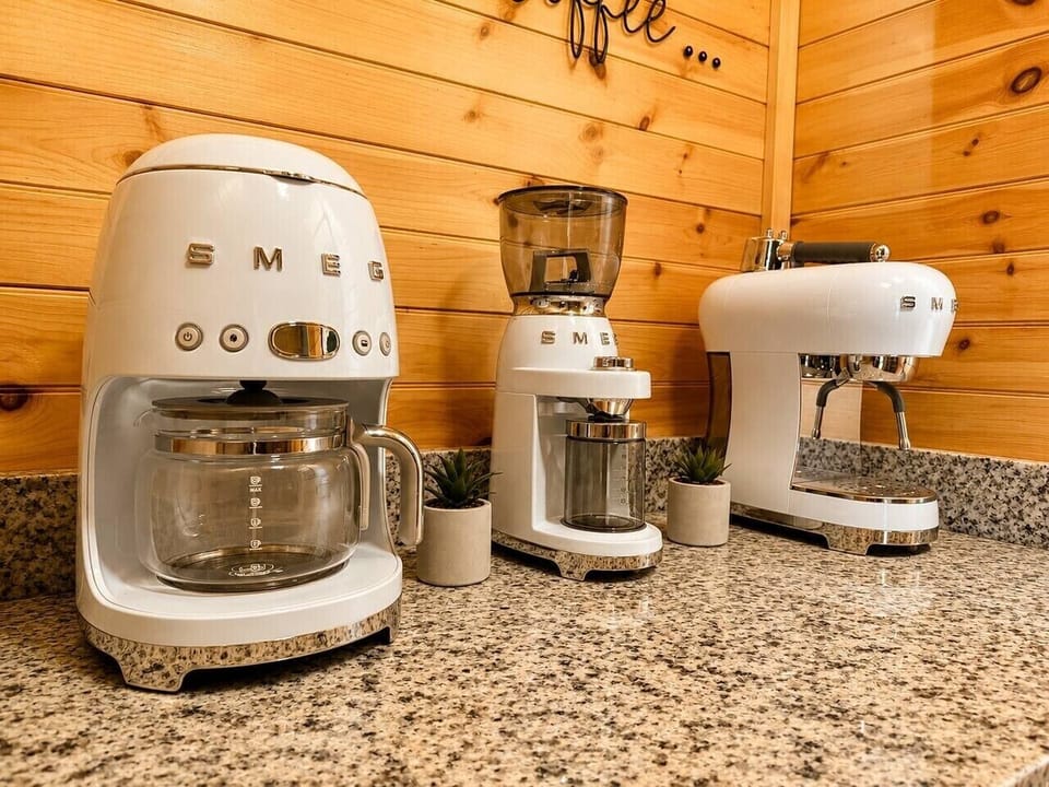 Coffee with a side of serenity. Modern appliances and plenty of counter space make meal prep a breeze—perfect for fueling your group’s riverfront adventures.