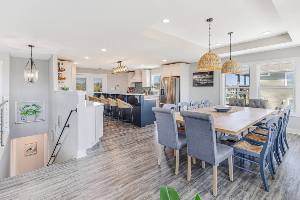 Table seating for 12 and add 5 seats at the bar