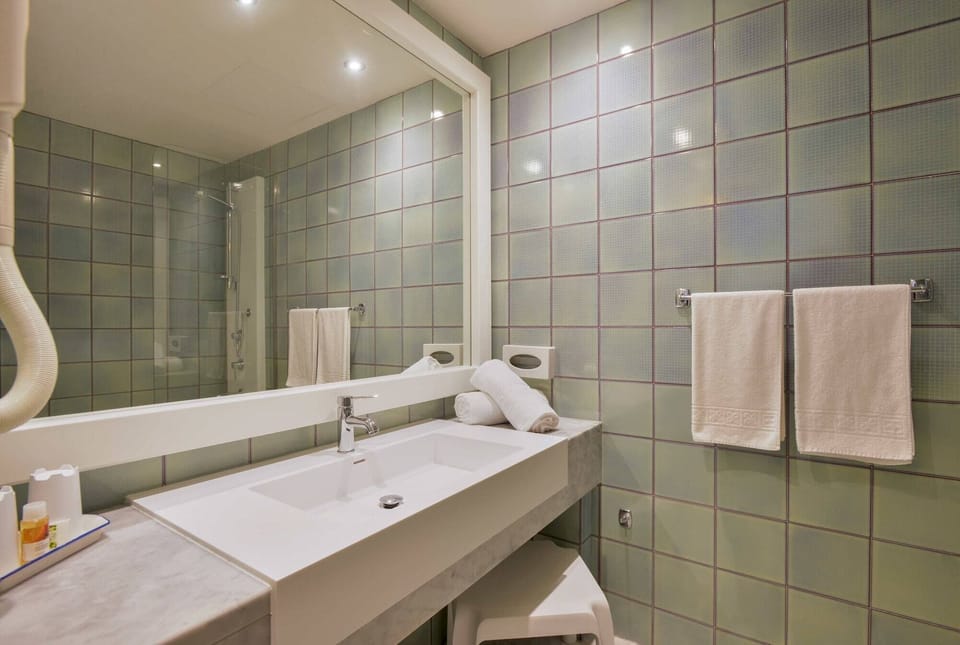Hair dryer, bidet, towels, soap