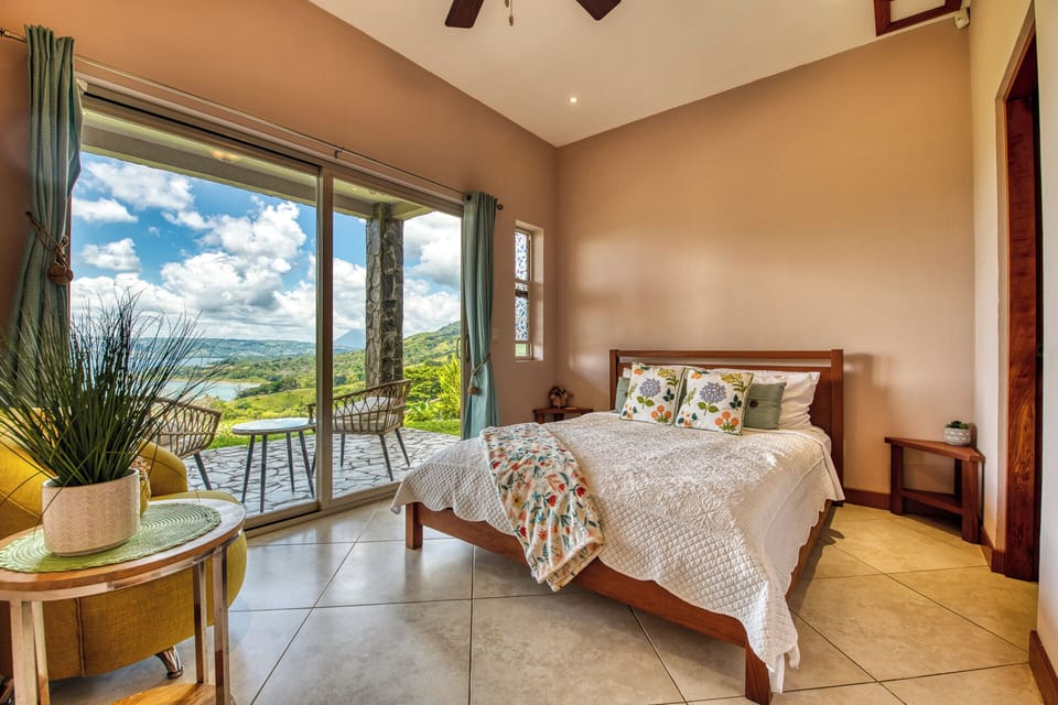 The beautiful bedroom with walk-out patio.
