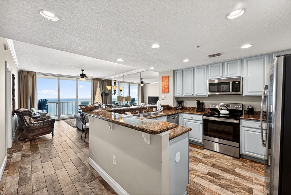 Cook up vacation magic in your fully equipped kitchen with granite countertops and stainless appliances.