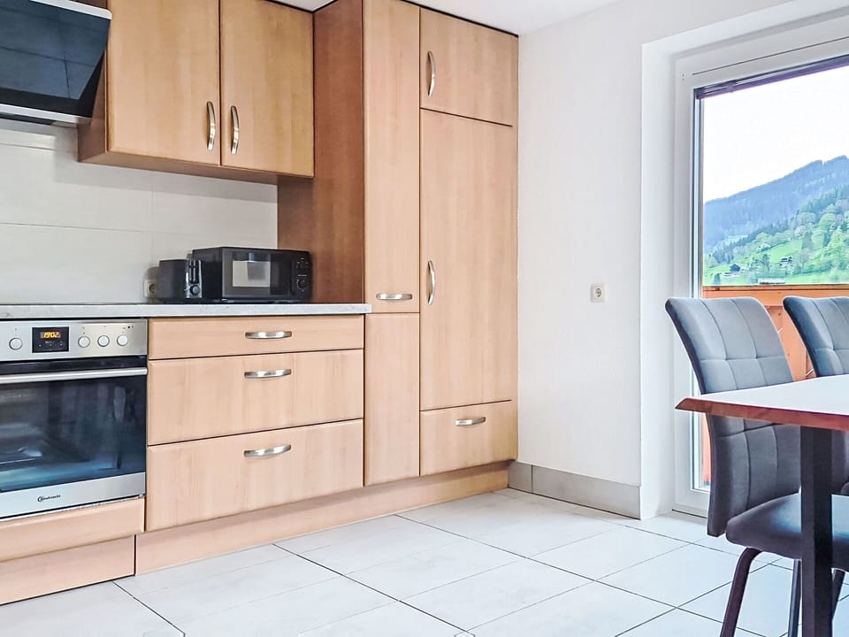 Furniture, Cabinetry, Wood, Interior Design, Flooring, Kitchen Appliance, Countertop, Kitchen, Major Appliance, Cupboard